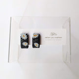 Huggies / Black Daisies